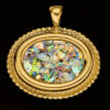 14K Gold Oval Pendant set with genuine Roman Glass